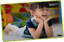 little girl posing and laughing